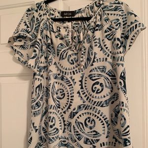 Green and white printed blouse